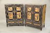 Pair of Chinese coromandel lacquered cabinets, two doors over two drawers having gilt and painted panels with birds perch on trees. height 48 inches, 