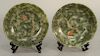 Pair of spinach green jade dishes, each having incised gilt branch decoration on both sides and a brown wax seal. diameter 5 inches. Provenance: An Es