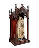 A Gothic Revival Mahogany Reliquary with a Continental Painted Figure of the Madonna