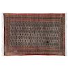 Tapete. Pakistán, siglo XX. Estilo Bokhara. Elaborado en fibras de lana, algodón y ensedado sobre fondo café.