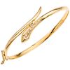 A yellow gold 18 K bracelet with simulants.