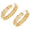 A yellow gold 18 K pair of hoops.
