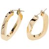 A yellow gold 18K pair of hoops.
