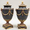 Pair of Wedgwood Black Basalt Bronze and Gilt-Decorated Vases and Covers