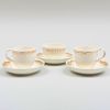 Pair of Wedgwood Gilt-Decorated Creamware Cups and Saucers and a Teabowl and Saucer
