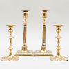 Two Pairs of George III Brass Candlesticks