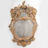 An Extraordinarily Fine and Unusual George III Cartouche-Shaped Giltwood Mirror, in the Chippendale Manner