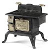 Wetter cast iron and nickel Gothic toy stove,
