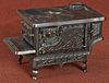 Grey Iron cast iron Crown toy stove, 6 3/4'' h.,