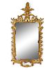 A George II Style Giltwood Mirror
Height 54 1/4 x width 27 1/2 inches.