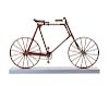 An American Oak and Metal "Boneshaker" Bicycle
Height 39 x width 65 x depth 19 inches.