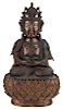 A GILT SINO-TIBETAN BRONZE FIGURE OF A GUANYIN WITH WOODEN BASE, 19TH CENTURY
