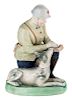 A LARGE RUSSIAN PORCELAIN FIGURE OF A RED ARMY SIGNALMAN WITH SERVICE DOG, GORODNITSKY PORCELAIN FACTORY, GORODNITSA, LATE 1930S