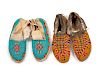 Two Pairs of Northern Plains Beaded Hide Moccasins
lengths 10 1/2 and 9 1/2 inches