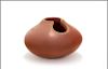 Marie Gonzales
(San Ildefonso, 20th Century)
San Ildefonso Redware Vase, having carved feather design with cut out at lip