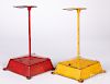 Two painted iron shoeshine stands