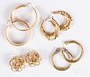 Four pairs of 14K gold earrings