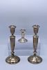 3 STERLING SILVER WEIGHTED CANDLESTICKS 