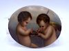 HAND PAINTED PORCELAIN PLAQUES WITH CUPIDS 