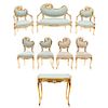 Sala. SXX. Estilo Luis XV. Elaborada en madera dorada. Consta de: loveseat, par de sillones, 4 sillas y mesa con cubierta de cristal.