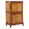 SECRÉTAIRE. FRANCE, 19TH CENTURY. LOUIS XV Style. Veneered wood with floral marquetry with gilded bronze details as claws, scrolls and plant motifs. M