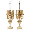 A PAIR OF TABLE LAMPS. Alabaster, gilded bronze and champlevé enamel. For four electric lights. Signed on the base "F. BARBEDIENNE".