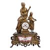 MANTEL CLOCK. CIRCA 1900. LOUIS PHILIPPE Style. Gilded bronze, gilded antimony and porcelain aplications. 21.5 in tall.