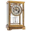 TABLE CLOCK. EE. UU., CIRCA 1900. EMPIRE Style. Gilded bronze and brass. 10.5 x 6.5 x 5 in