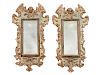A Pair of Italian Painted and Gilt Gesso Mirrors 
Height 32 1/2 x width 18 inches.