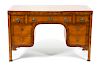 An Italian Neoclassical Inlaid Satinwood Desk
Height 29 x width 46 x depth 24 3/4 inches.