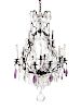 A Louis XV Style Bronze and Crystal Eight-Light Chandelier
Height 34 x diameter 27 inches.