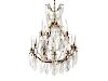 A Louis XV Style Gilt Bronze and Cut Crystal Chandelier
Height 36 x diameter 26 inches.