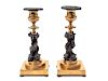 A Pair of French Gilt Bronze and Ebonized Figural Candlesticks
Height 8 inches.
