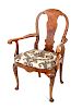A George I Style Burlwood Open Armchair
Height 38 1/2 x width 27 x depth 18 inches.
