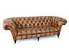 A Brown Leather Upholstered Chesterfield Sofa
Height 32 x width 98 x depth 42 inches.