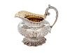 A Victorian Silver Creamer
Height 5 inches.