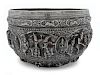 A Burmese Silver Repousse Basin
Height 8 1/2 x diameter 13 inches.