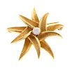 A Ladies 18K and Diamond Flower Pin/Pendant