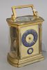 French brass and glass carriage clock having blue enameled king dial brass works marked French escapt, 11 jewels. ht. 5 1/4 in. without handle.