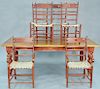 Contemporary farm style table and six chairs, each with woven hyde seats, table has hand planed top and three drawers on either side. ht. 30 in., top: