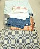 Group of eight quilts and coverlets, two American blue and white coverlets, light blue and white coverlet, blankets and quilts.