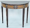 Adams style demilune table. ht. 31 in., dp. 18 in.