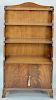George IV style mahogany bookcase with two door base, ht. 50 in., wd. 26 in.