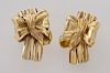 Pr. 22K gold bow style earrings with clip backs.