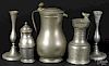Two Continental pewter flagons, together with a pair of candlesticks and a syrup pitcher