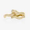 CARTIER, FRANCE, DIAMOND & YELLOW GOLD "WAVE" BAND RINGS