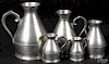 Five Irish pewter haystack measures, 19th c., sizes ranging from a half noggin to one quart
