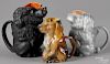 Three Royal Bayreuth porcelain dog creamers, to include two poodles, 4 1/2" h. and 5 1/4" h.