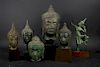 Group of Cambodian Bronze Heads and Buddha.