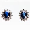 A PAIR OF SAPPHIRE AND DIAMOND STUD EARRINGS, the oval cut 
